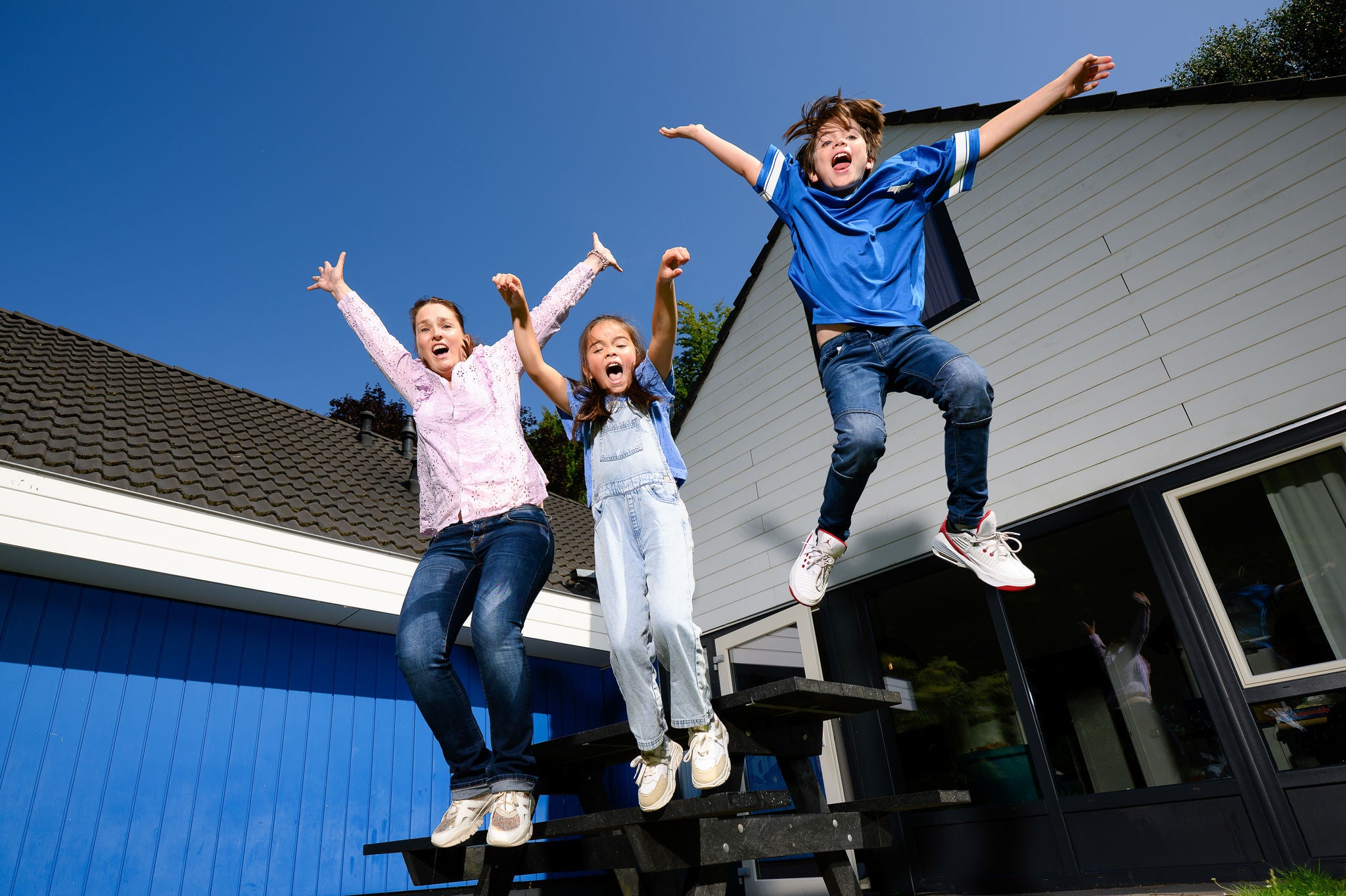 Enjoying together at an 8-person cottage at Walibi Village.