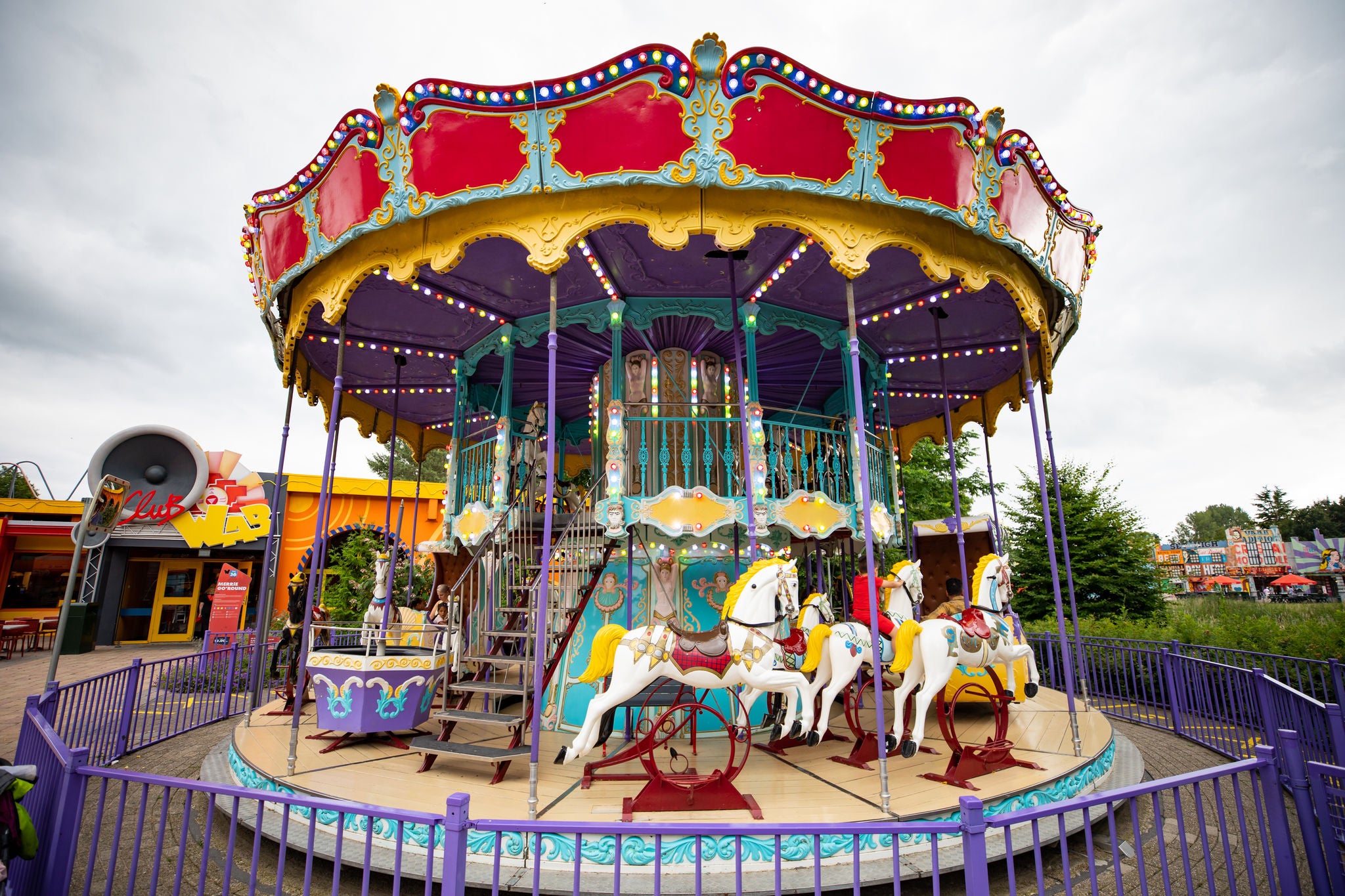 The colorful attraction of Merrie go'round in Walibi Holland, on the first floor we can see poneys 