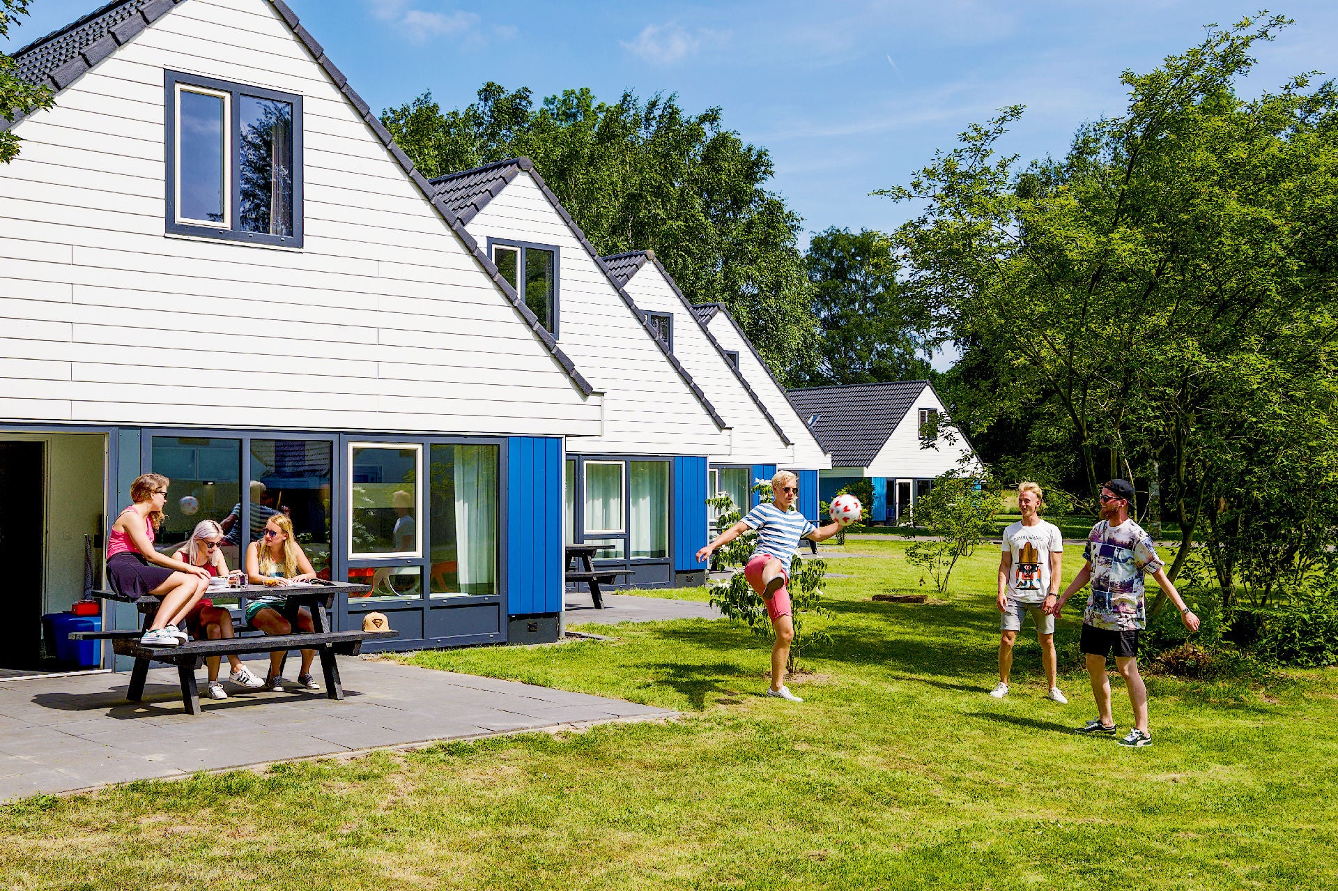 Enjoying together at an 8-person cottage at Walibi Village.