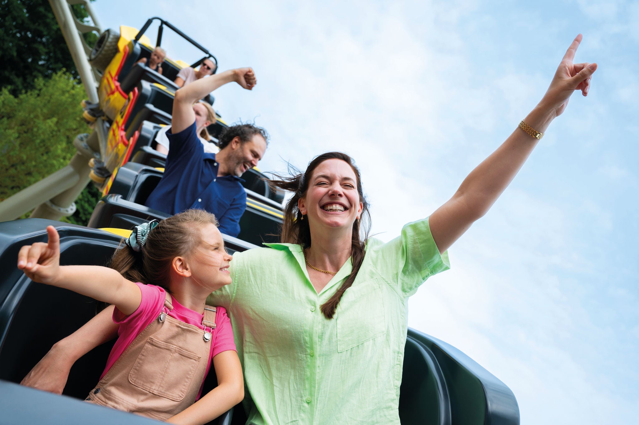 A mother and a daughter on eat my dust attraction at Walibi Holland