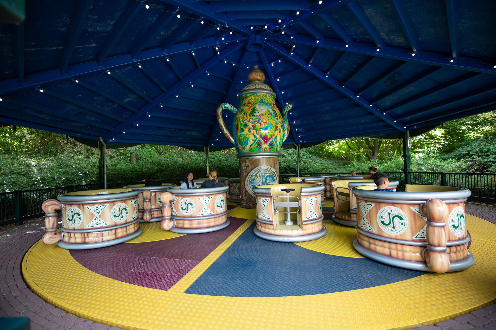 Get into the teacups together at Walibi Holland.